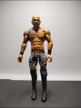 Articulated Male Action Figure in Tan and Black Wrestling Gear